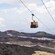 A cable car ascends Mount Etna in Sicily, Italy